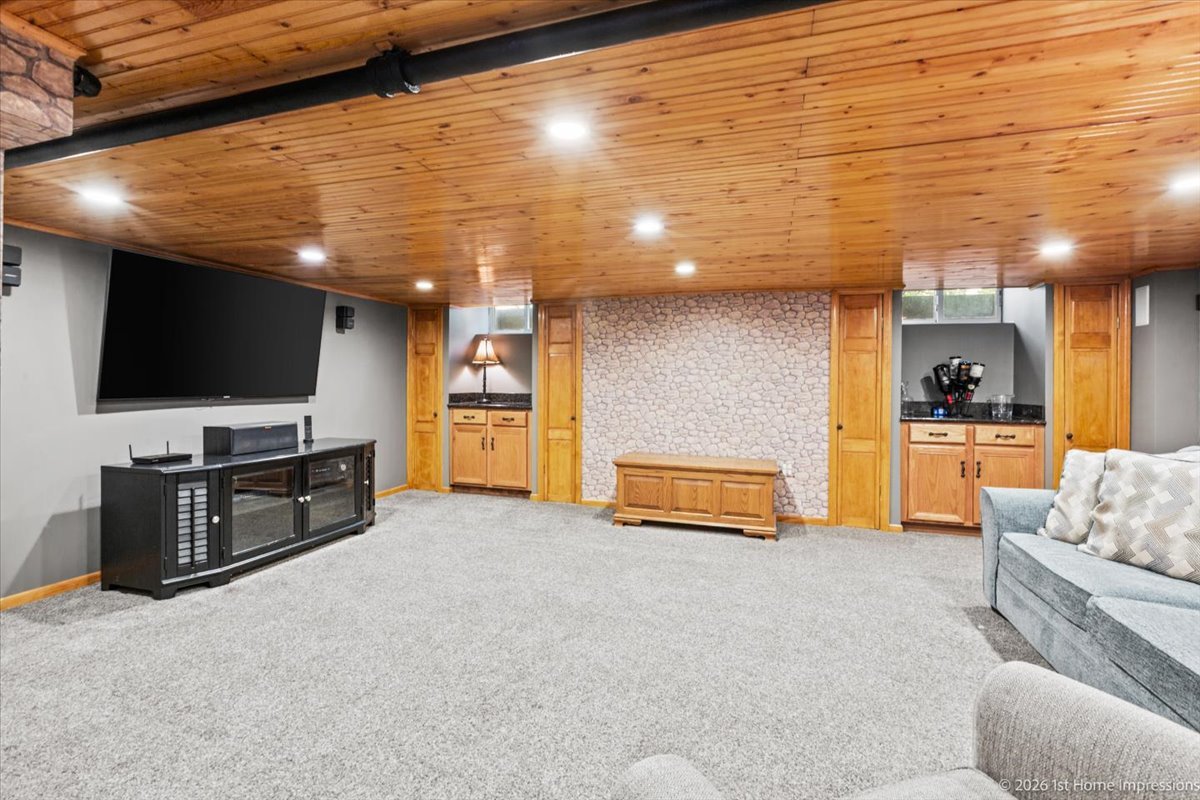 9955 South Hamilton Avenue Chicago, IL 60643 - Photo 24 of 31 a living room with furniture and a flat screen tv