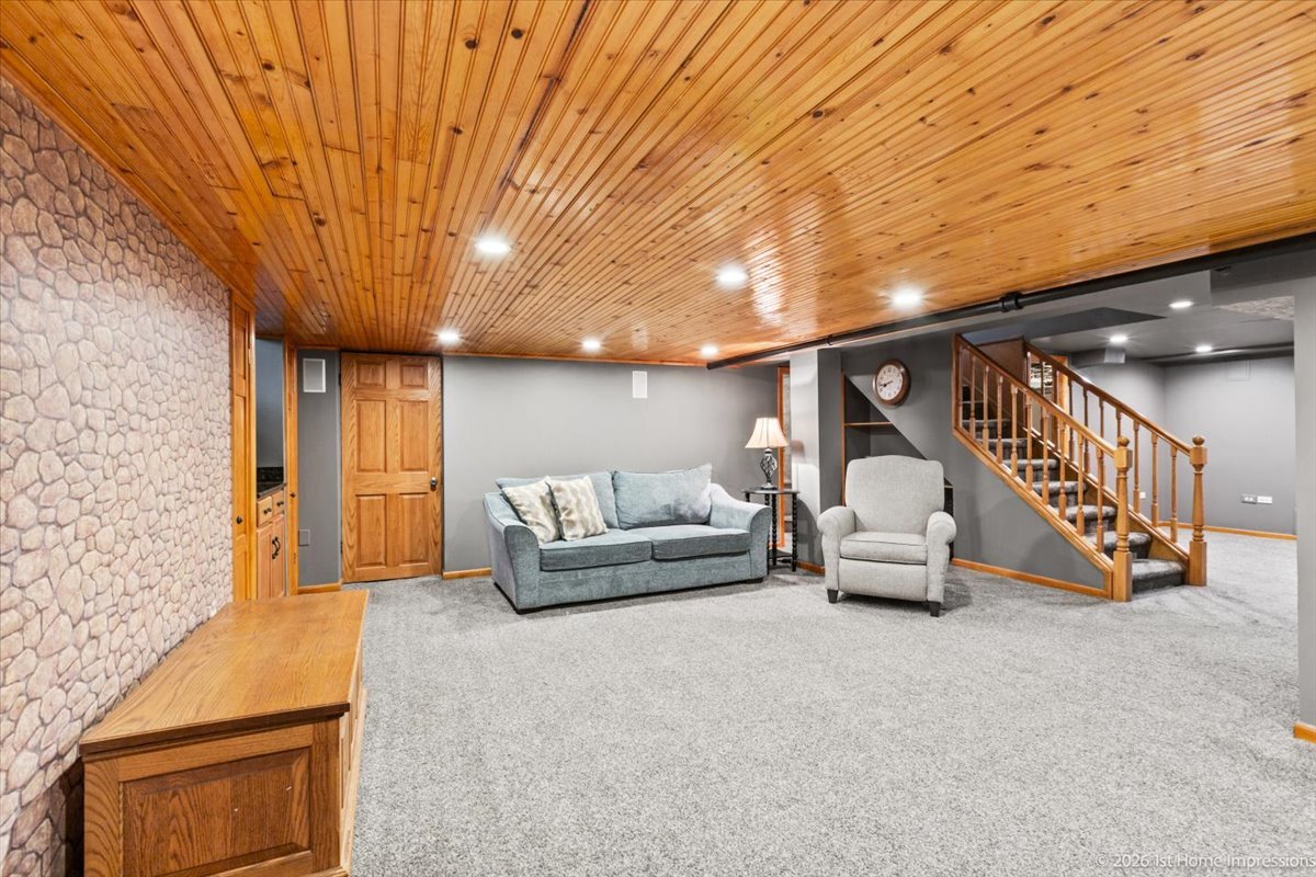 9955 South Hamilton Avenue Chicago, IL 60643 - Photo 25 of 31 a living room with furniture and a chandelier