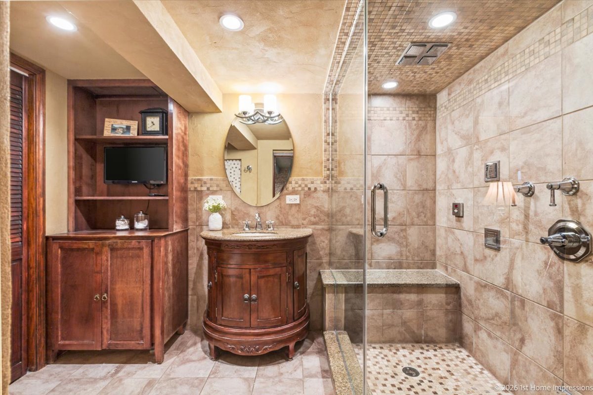 9955 South Hamilton Avenue Chicago, IL 60643 - Photo 26 of 31 a bathroom with a sink and a mirror