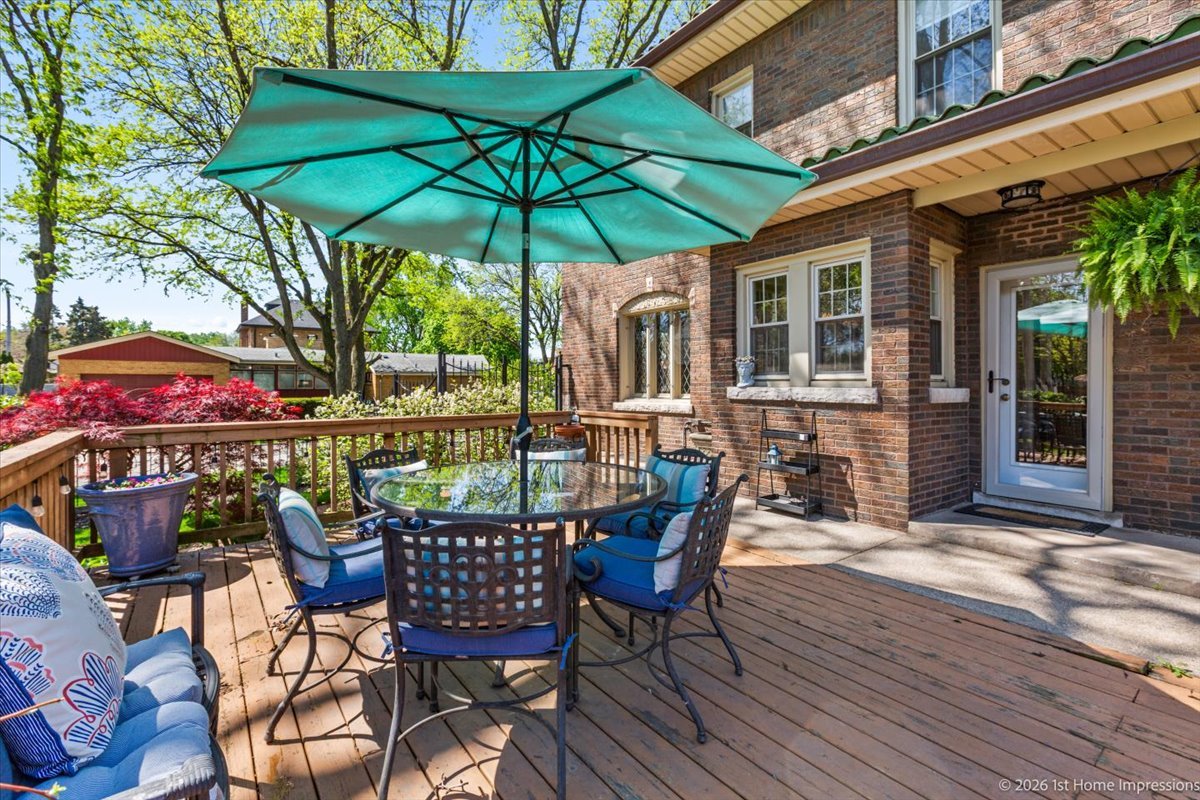 9955 South Hamilton Avenue Chicago, IL 60643 - Photo 30 of 31 a patio with a patio table and chairs