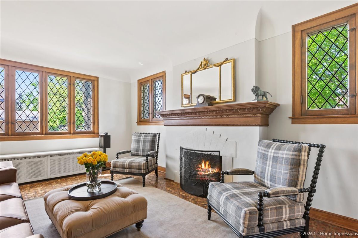 9955 South Hamilton Avenue Chicago, IL 60643 - Photo 7 of 31 a living room with furniture a fireplace and a large window