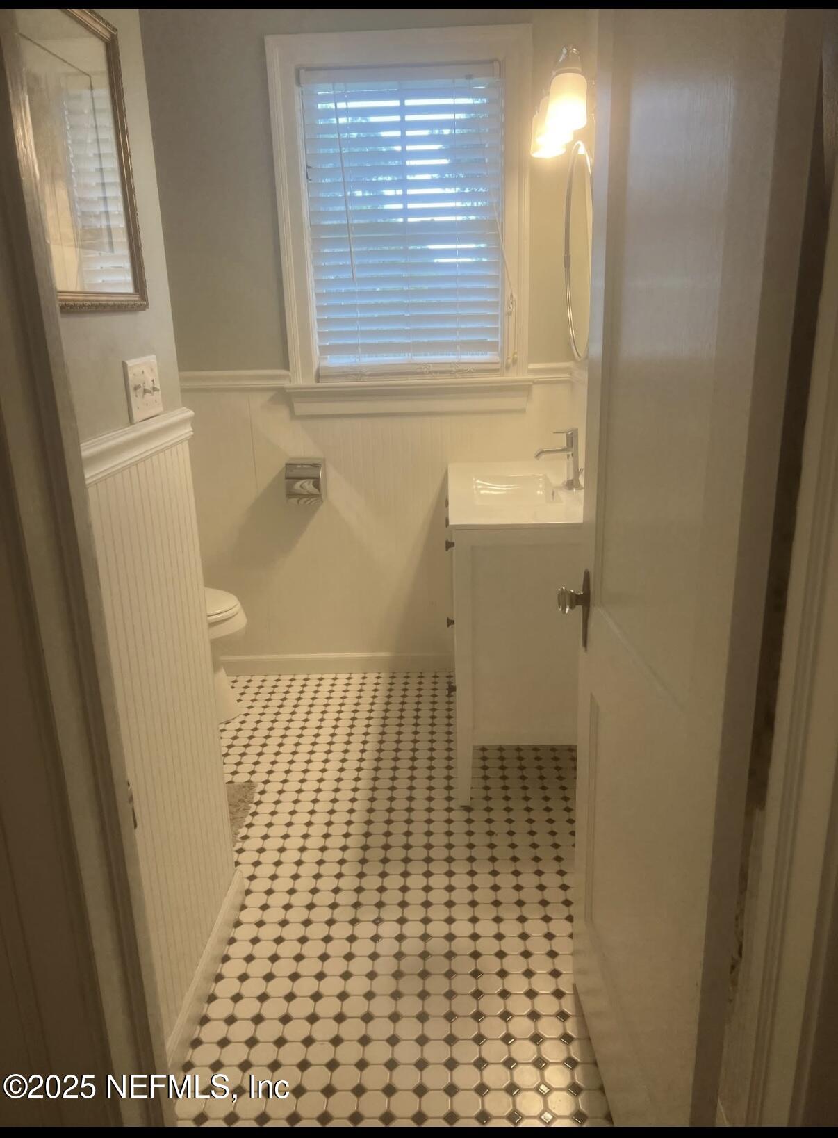 1802 Kingswood Road Jacksonville, FL 32207 - Photo 7 of 13 a bathroom with a shower