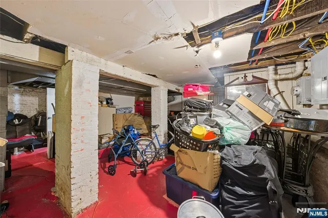 a view of a cars parked on the side of a street