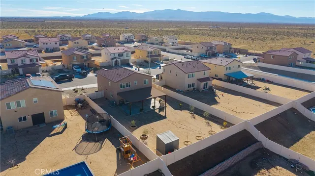 an aerial view of a building with outdoor space