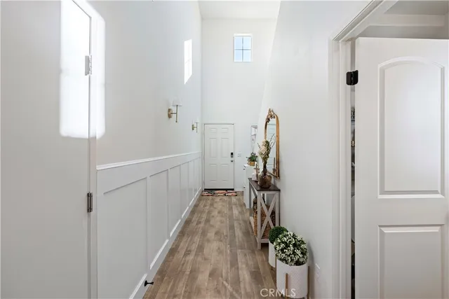 a view of entryway with wooden floor