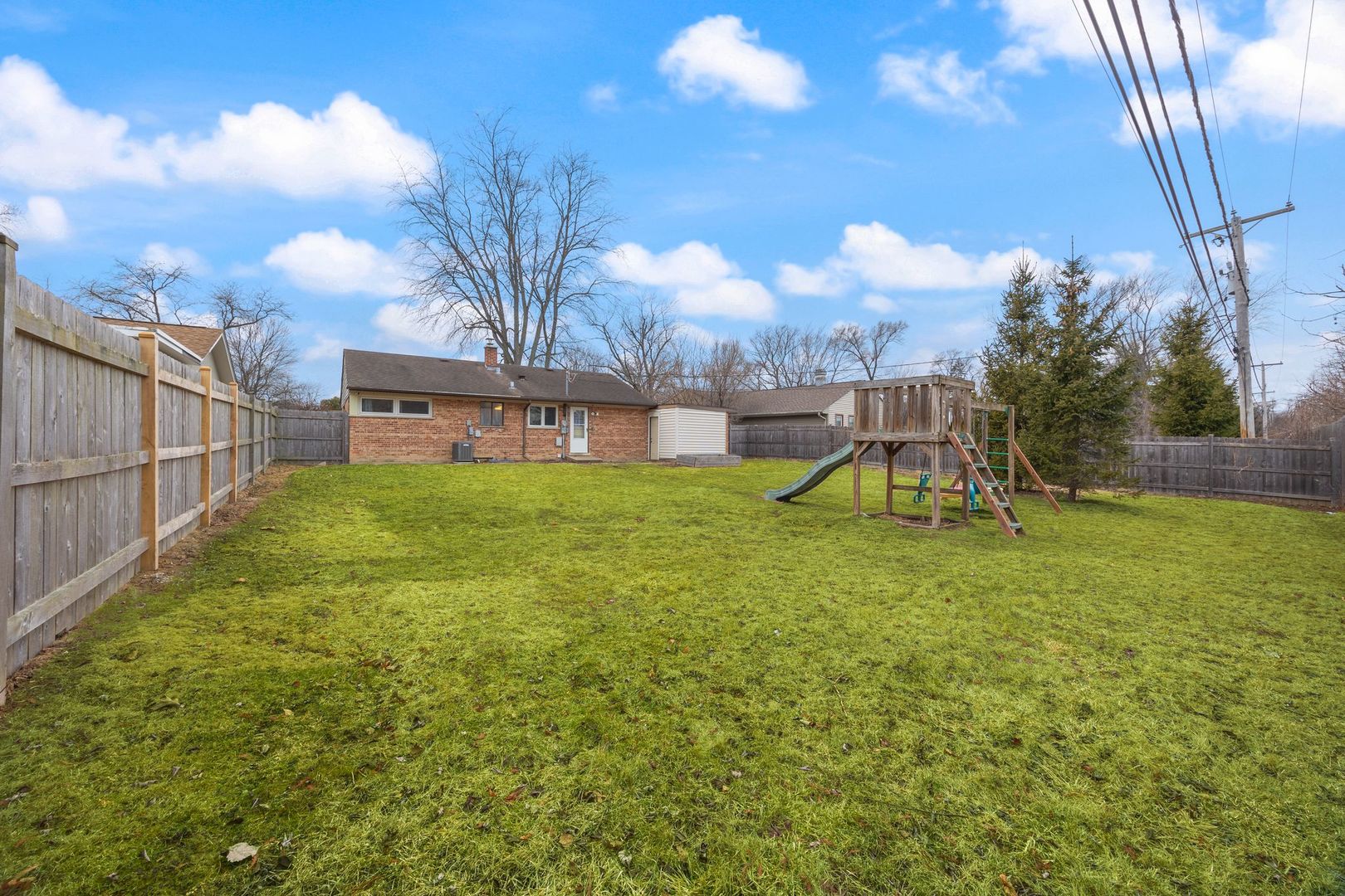 1145 Dell Road Northbrook, IL 60062 - Photo 21 of 22 a view of a garden with a slide
