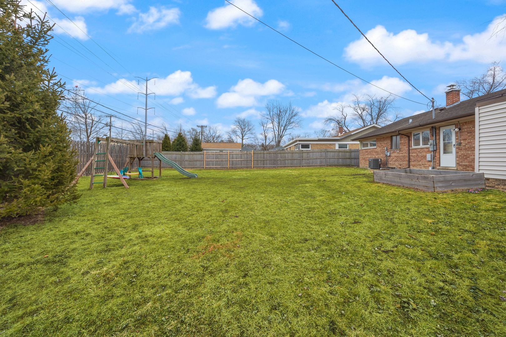 1145 Dell Road Northbrook, IL 60062 - Photo 22 of 22 a view of a house with a yard