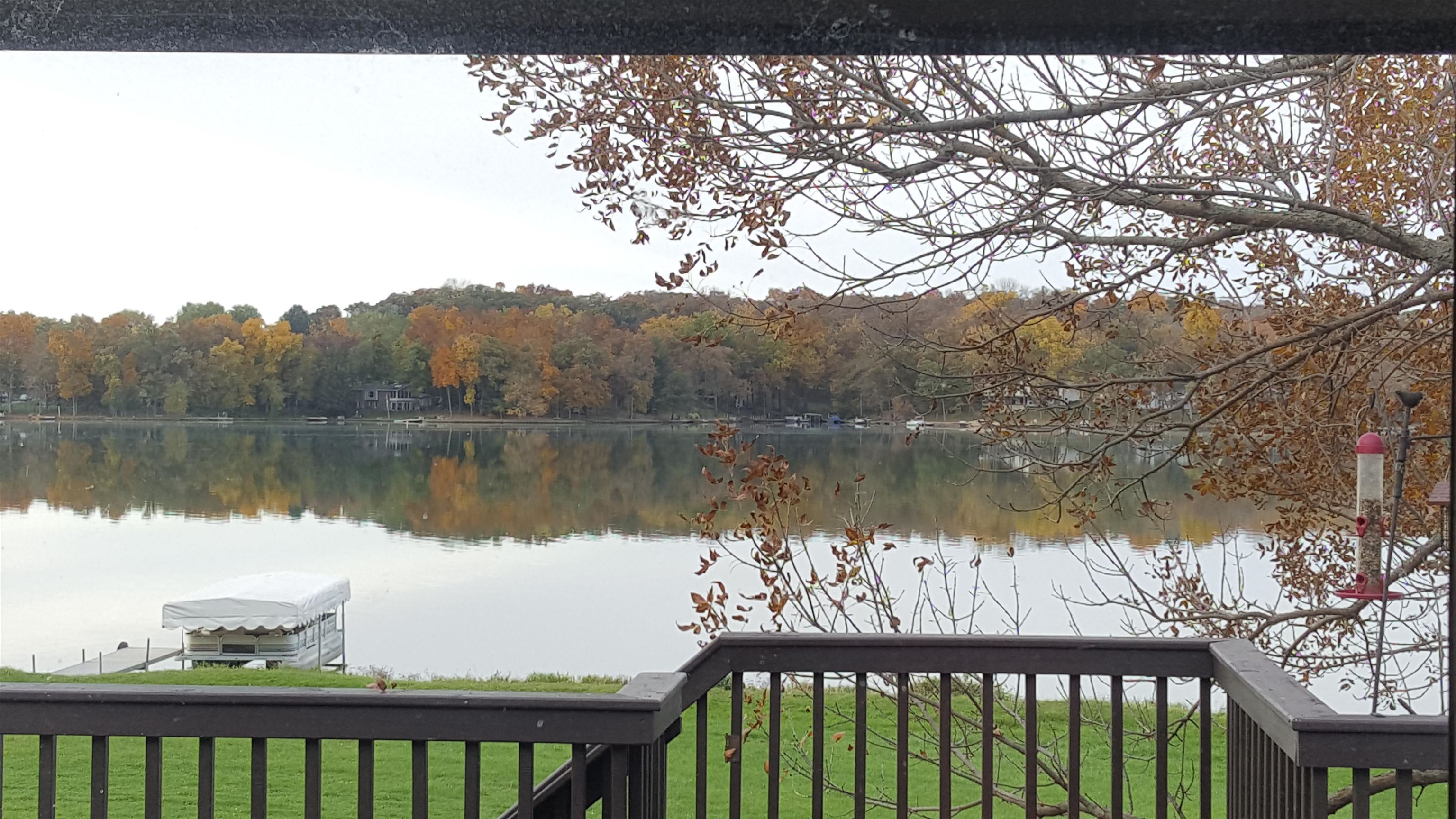 1025 Lake Summerset Road Lake Summerset, IL 61019 - Photo 3 of 15 a view of a lake from a balcony