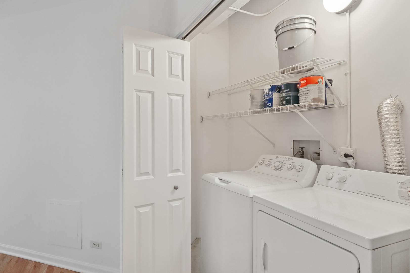 161 West Harrison Street, Unit 1007 Chicago, IL 60605 - Photo 29 of 35 a utility room with dryer and washer