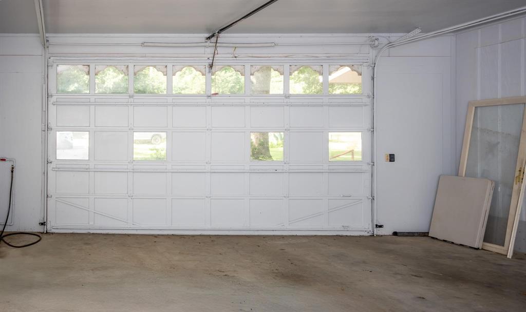 523 Big Lake Road Karnack, TX 75661 - Photo 24 of 27 a view of an empty room with a window