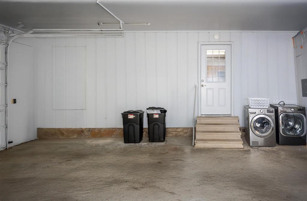 523 Big Lake Road Karnack, TX 75661 - Photo 25 of 27 a view of a storage & utility room with a washing machine