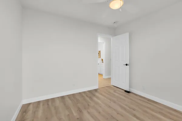a view of an empty room and window