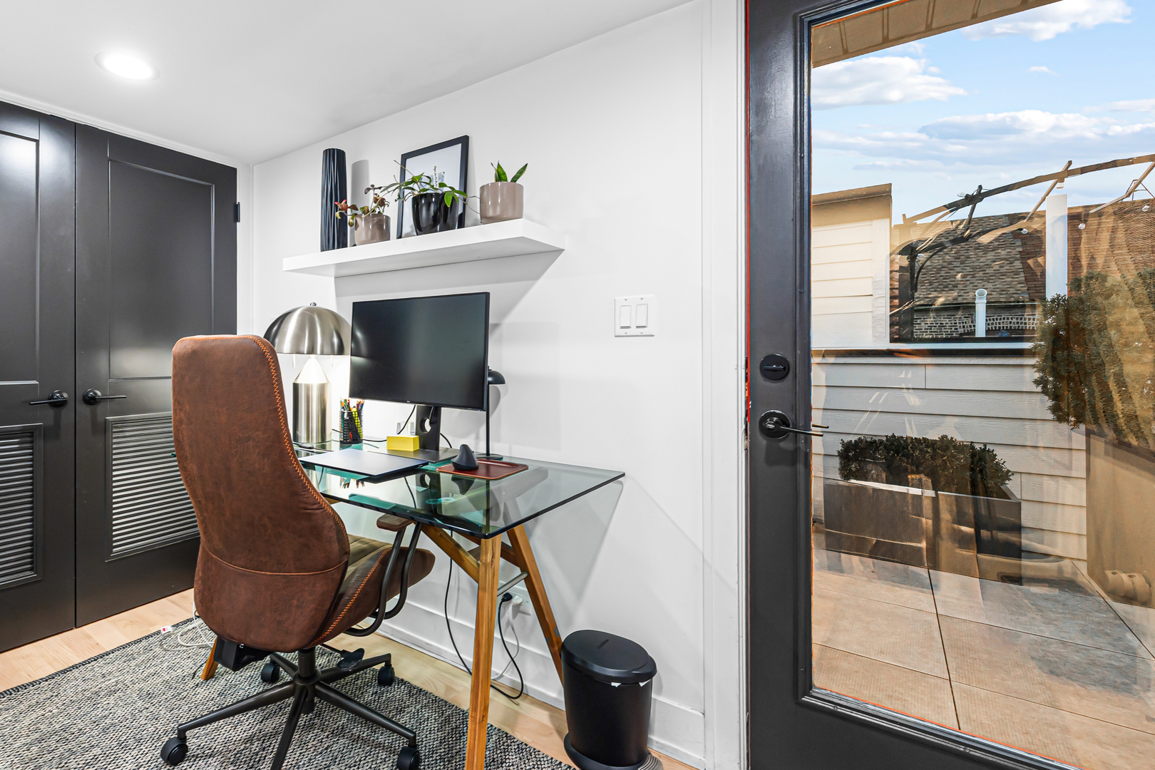 1738 West 17th Street, Unit 3 Chicago, IL 60608 - Photo 15 of 23 a view of a workspace with furniture and a window