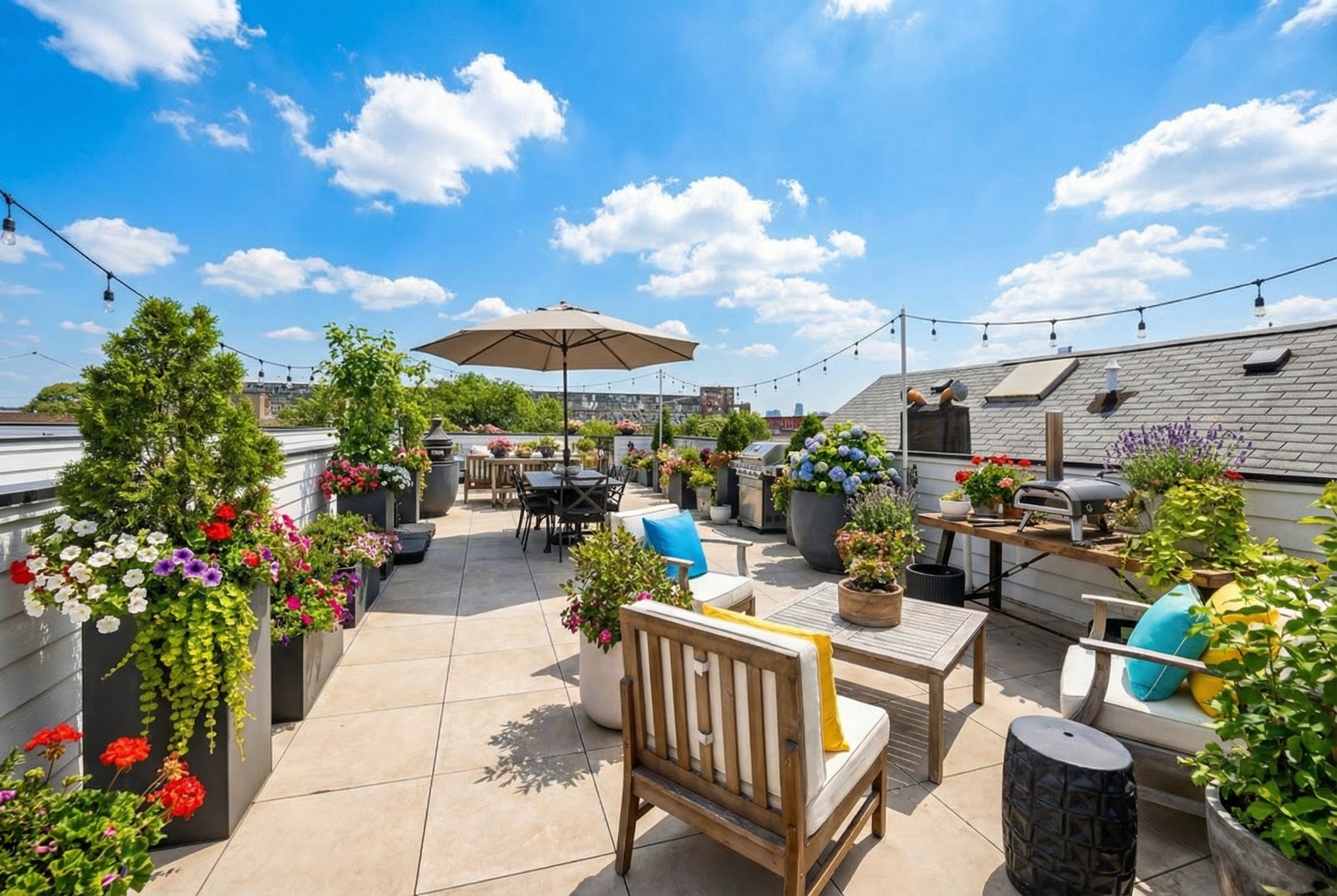 1738 West 17th Street, Unit 3 Chicago, IL 60608 - Photo 16 of 23 a view of a patio with couches table and chairs and potted plants