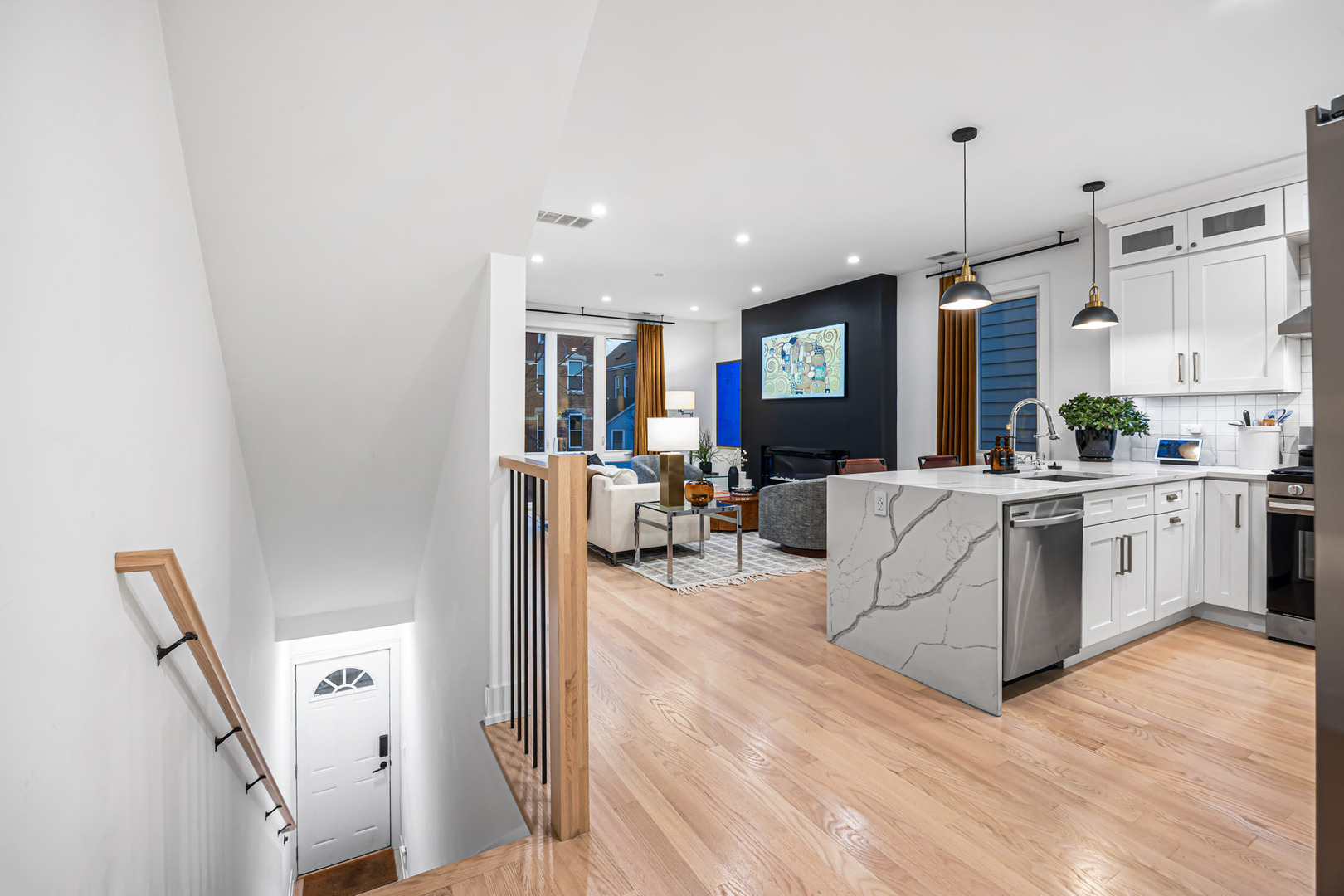 1738 West 17th Street, Unit 3 Chicago, IL 60608 - Photo 2 of 23 a living room with furniture and a flat screen tv
