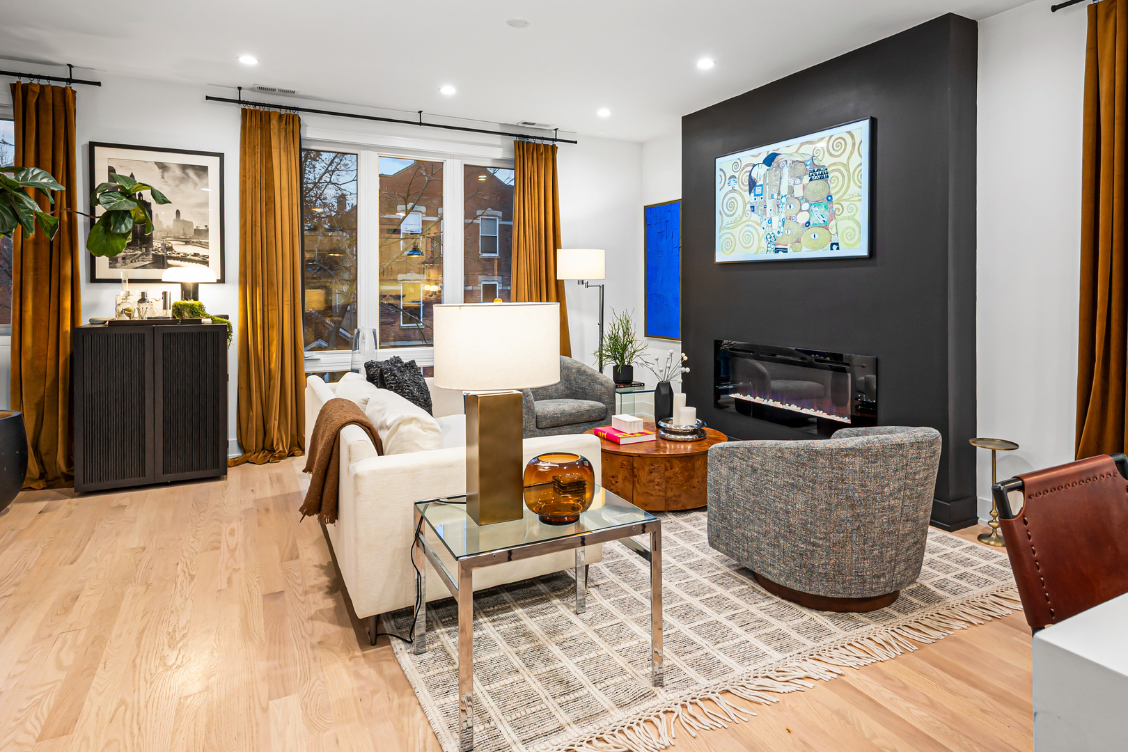1738 West 17th Street, Unit 3 Chicago, IL 60608 - Photo 3 of 23 a living room with furniture a rug and white walls