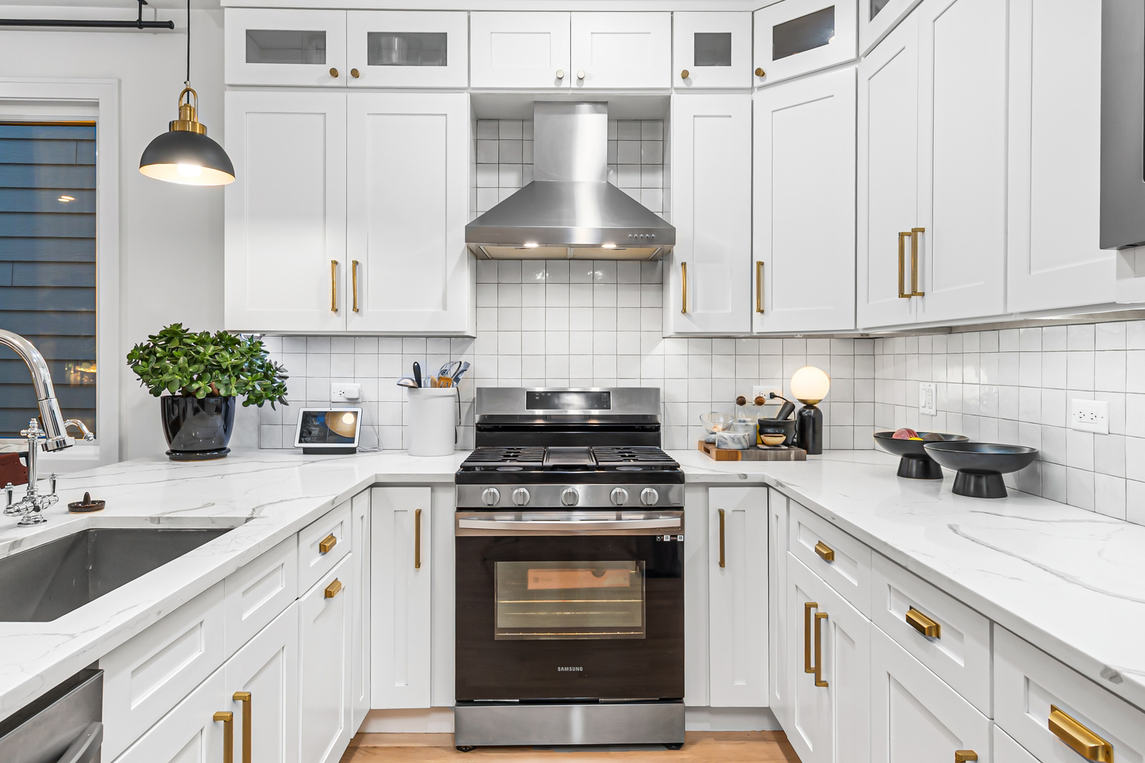 1738 West 17th Street, Unit 3 Chicago, IL 60608 - Photo 6 of 23 a kitchen with a stove top oven and cabinets