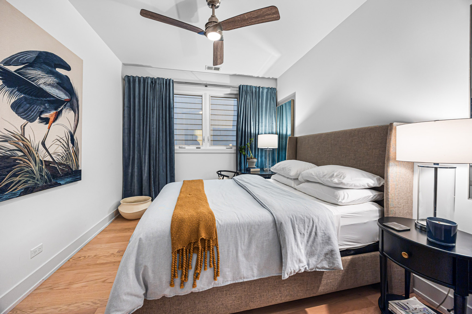 1738 West 17th Street, Unit 3 Chicago, IL 60608 - Photo 8 of 23 a bedroom with a bed and a lamp