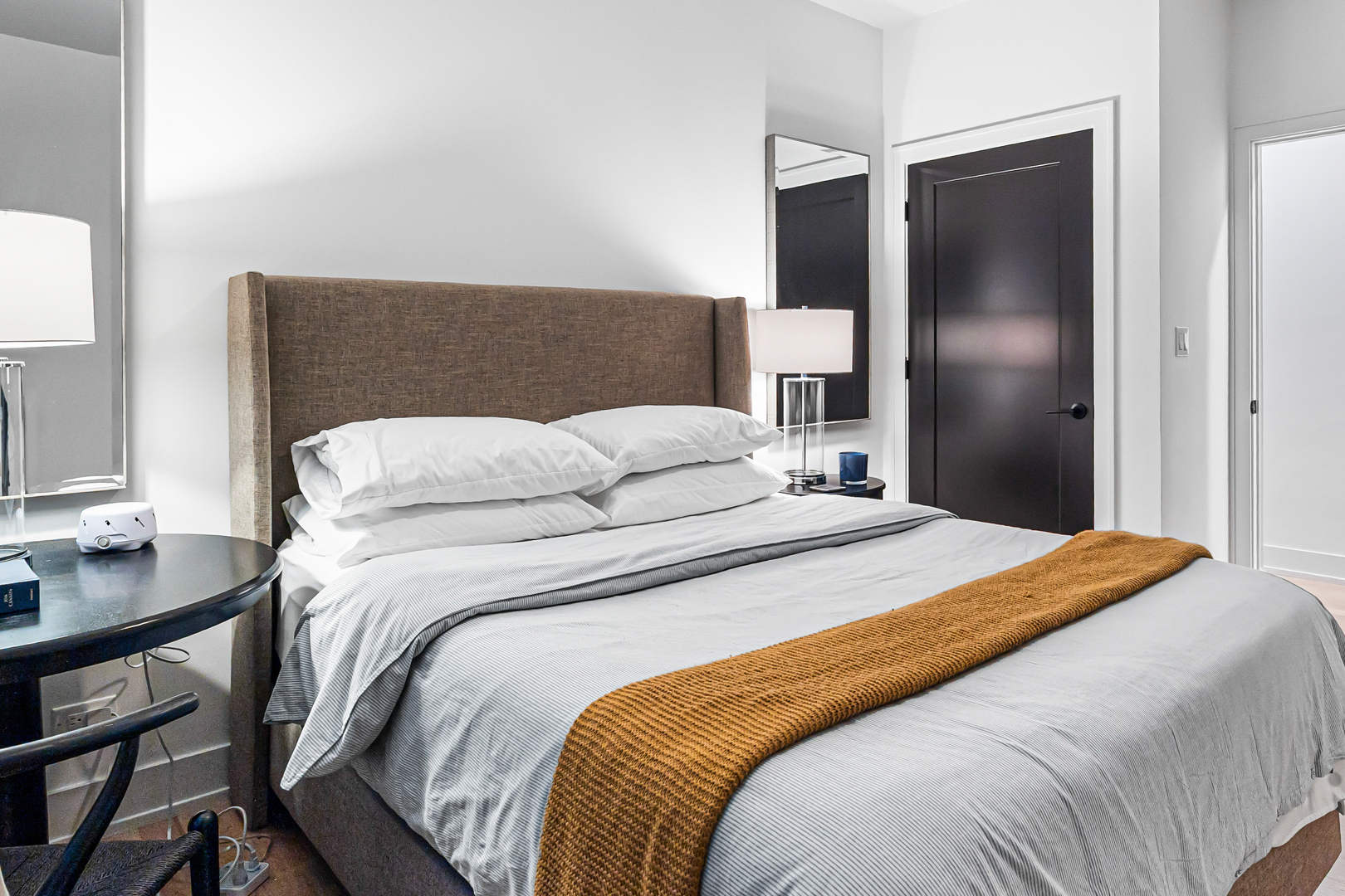 1738 West 17th Street, Unit 3 Chicago, IL 60608 - Photo 9 of 23 a bedroom with a bed and a table in it