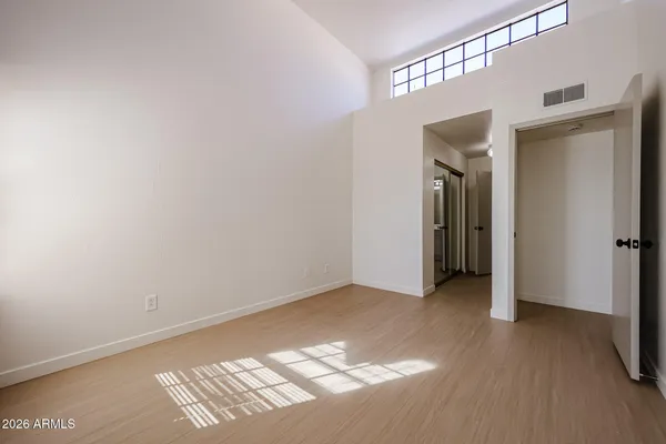 a view of an empty room and window