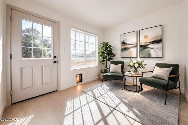 a living room with furniture and a window