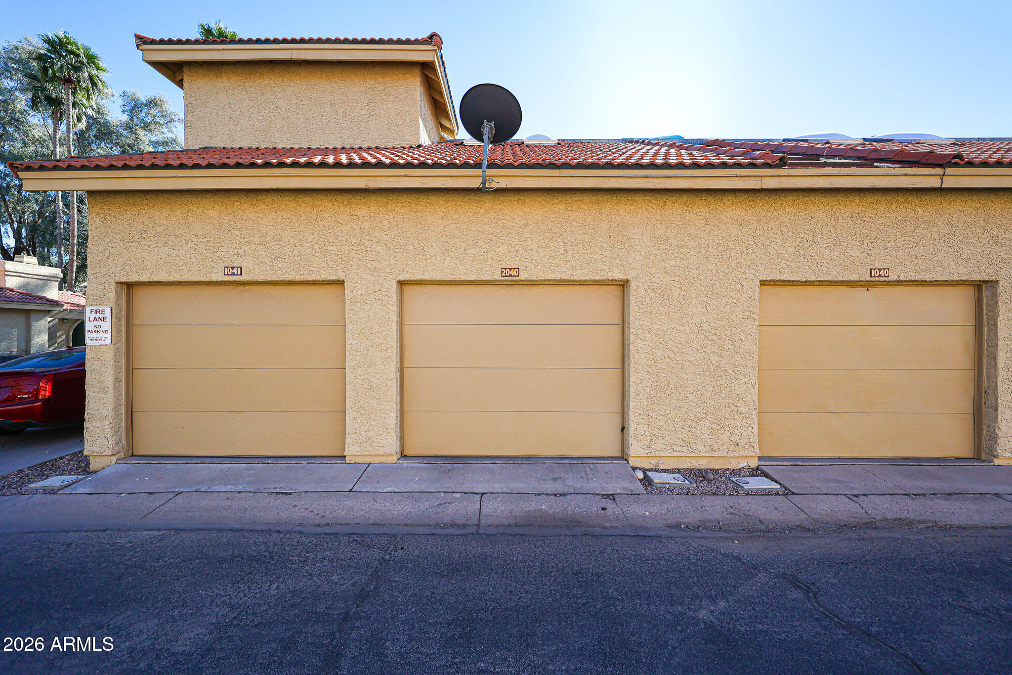 1126 West Elliot Road, Unit 2040 Chandler, AZ 85224 - Photo 26 of 27 Garage with Interior Stairway