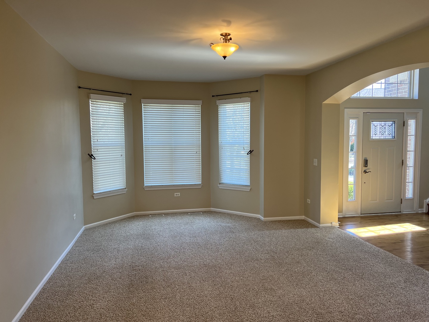 26112 Mapleview Drive Plainfield, IL 60585 - Photo 2 of 28 a view of an empty room with a window