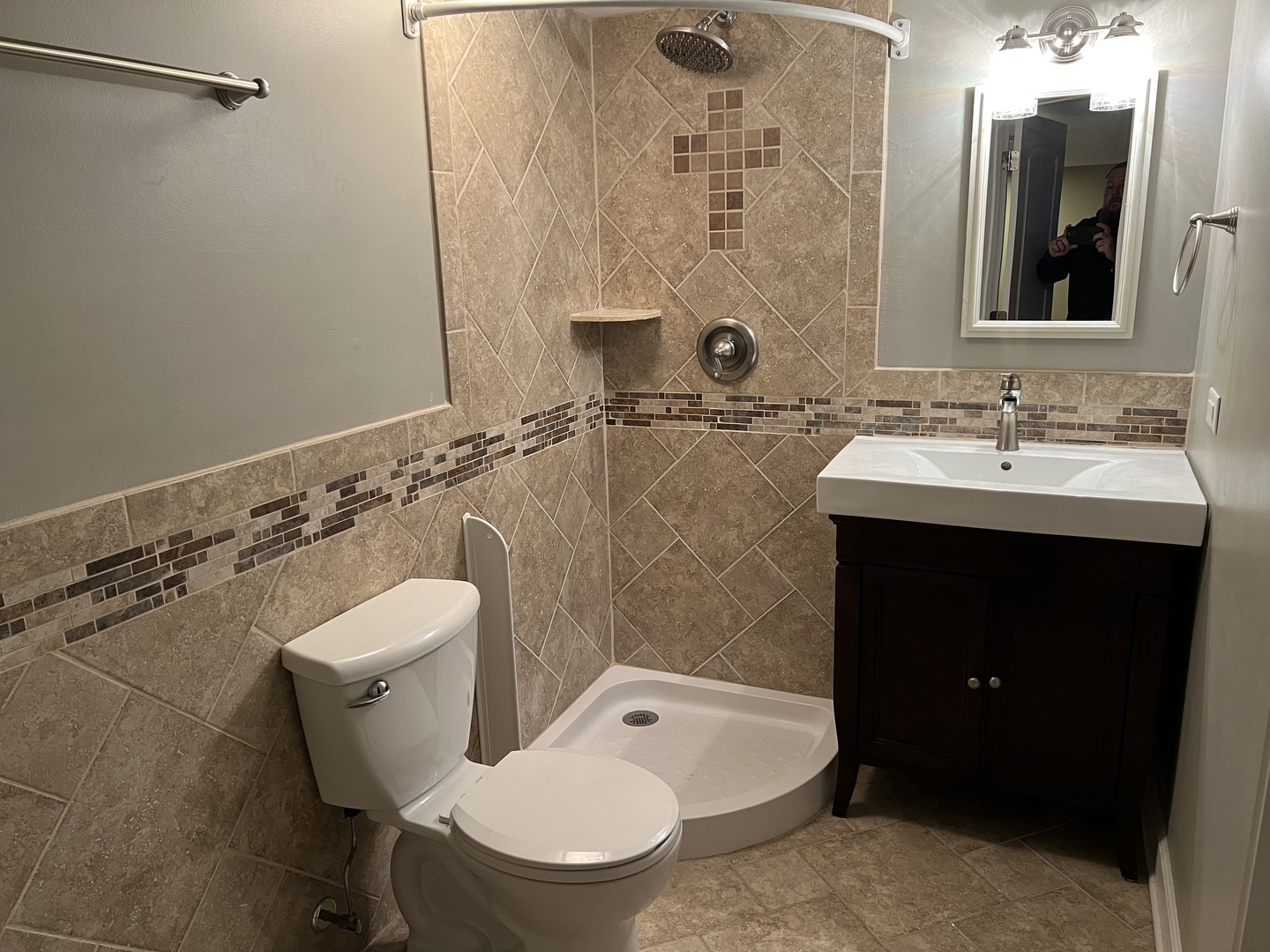 26112 Mapleview Drive Plainfield, IL 60585 - Photo 25 of 28 a bathroom with a toilet sink and mirror