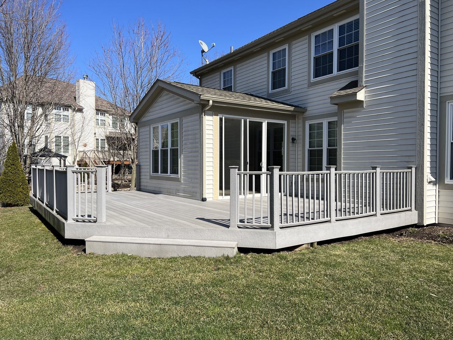 26112 Mapleview Drive Plainfield, IL 60585 - Photo 27 of 28 a view of a house with a small yard and wooden fence