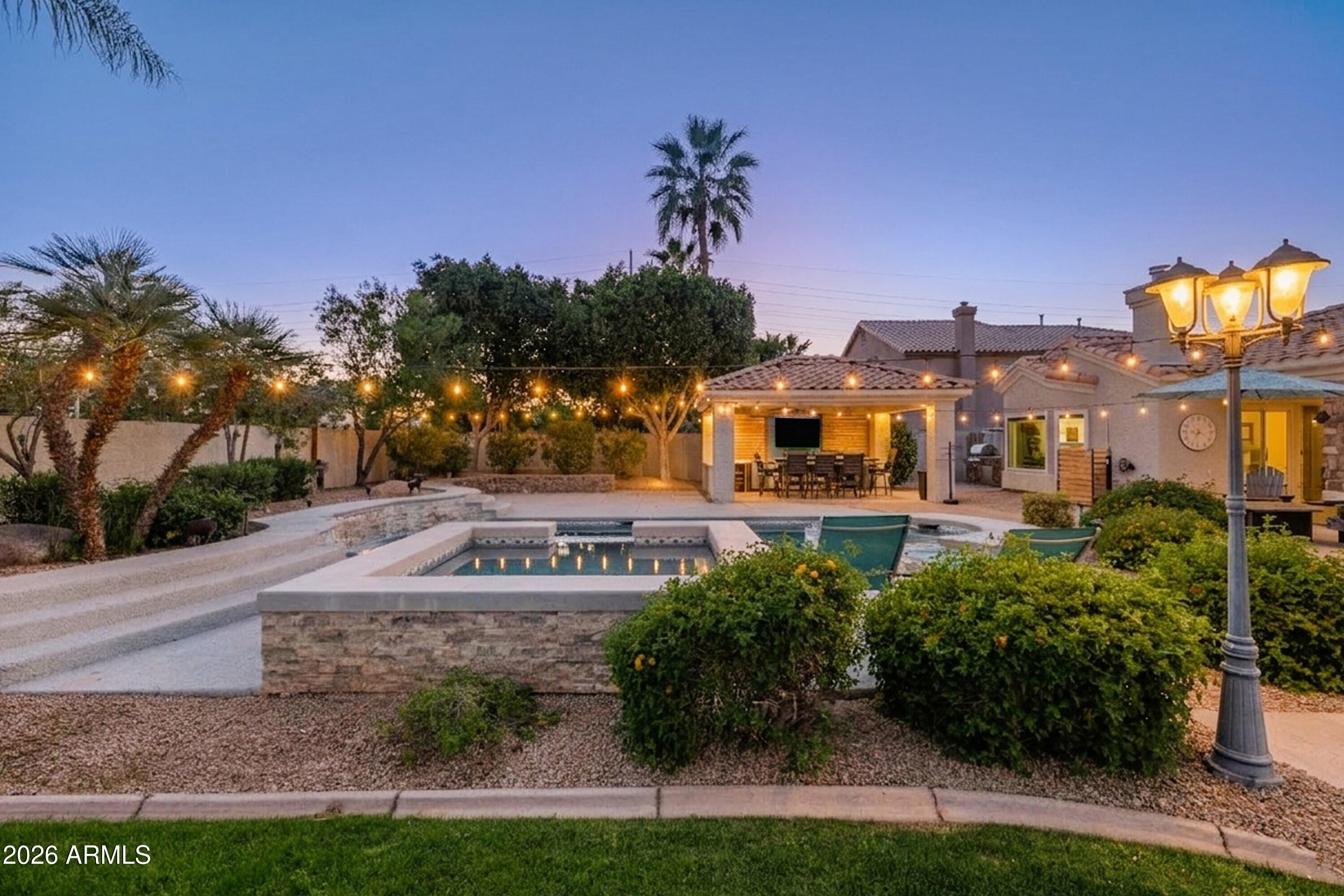 2047 East Victor Road Gilbert, AZ 85296 - Photo 42 of 56 Backyard and Bistro Lighting at Twilight