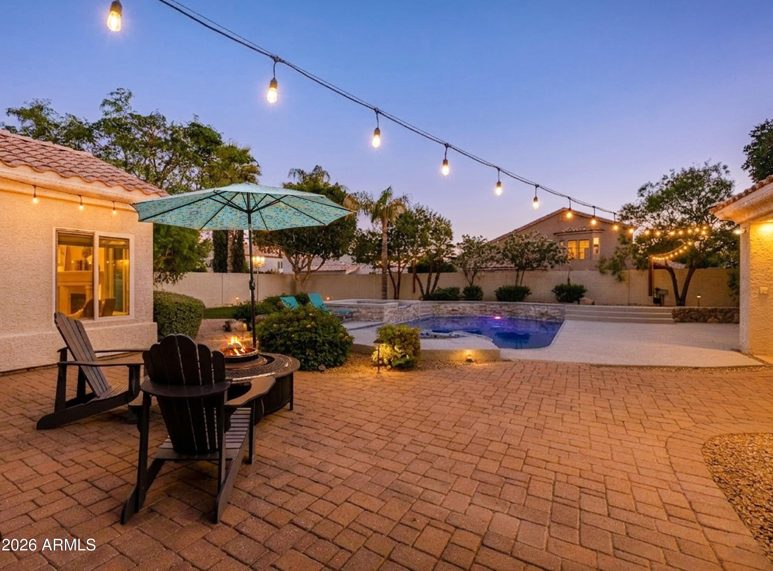 2047 East Victor Road Gilbert, AZ 85296 - Photo 43 of 56 Fire Pit and Seating at Twilight