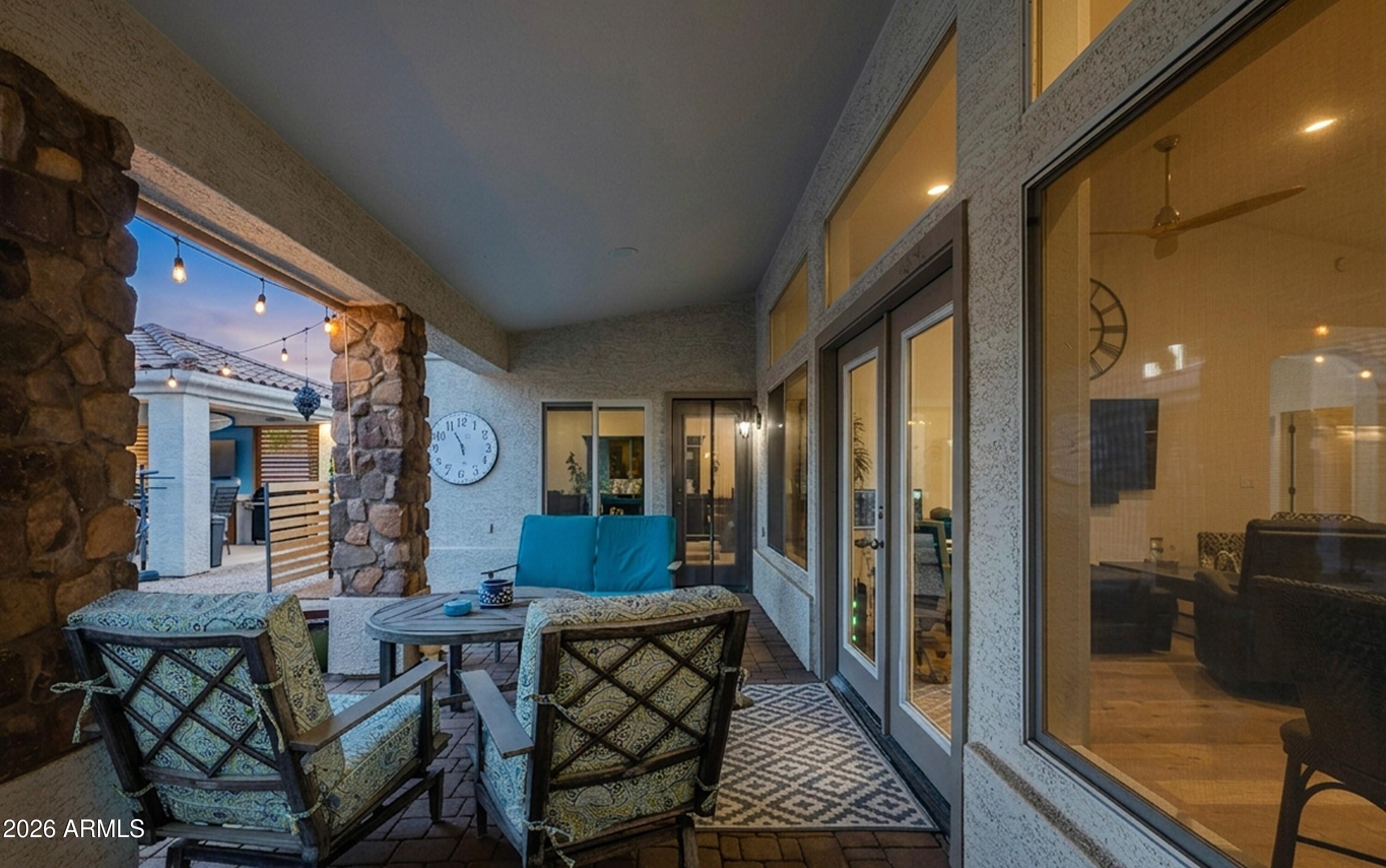 2047 East Victor Road Gilbert, AZ 85296 - Photo 44 of 56 Covered Patio Seating at Twilight