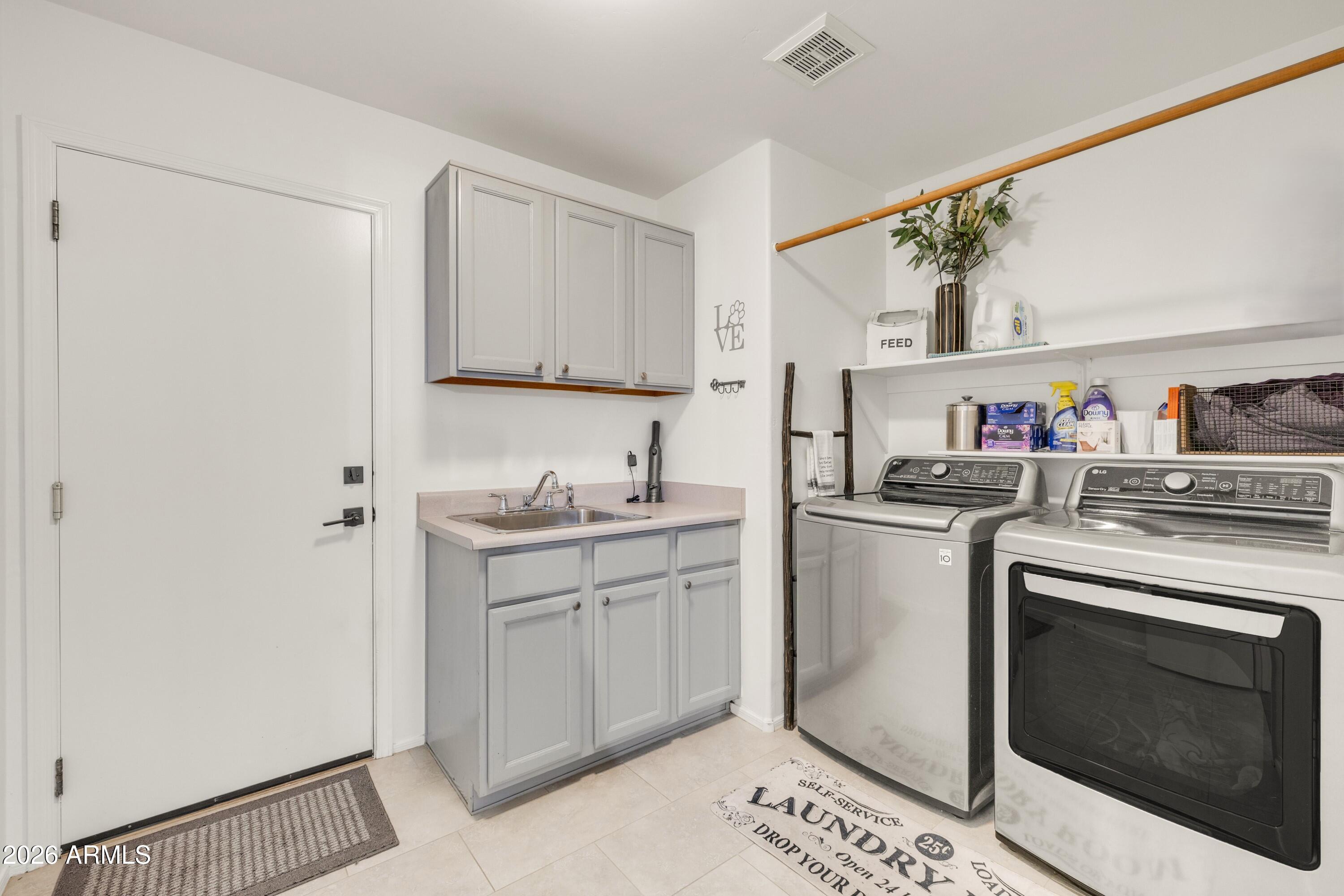 2047 East Victor Road Gilbert, AZ 85296 - Photo 46 of 56 Laundry and Garage Door Access