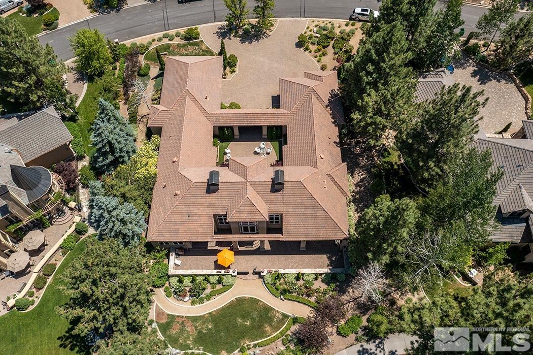 5835 Strasbourg Court Reno, NV 89511 - Photo 35 of 35 an aerial view of a house with swimming pool and garden