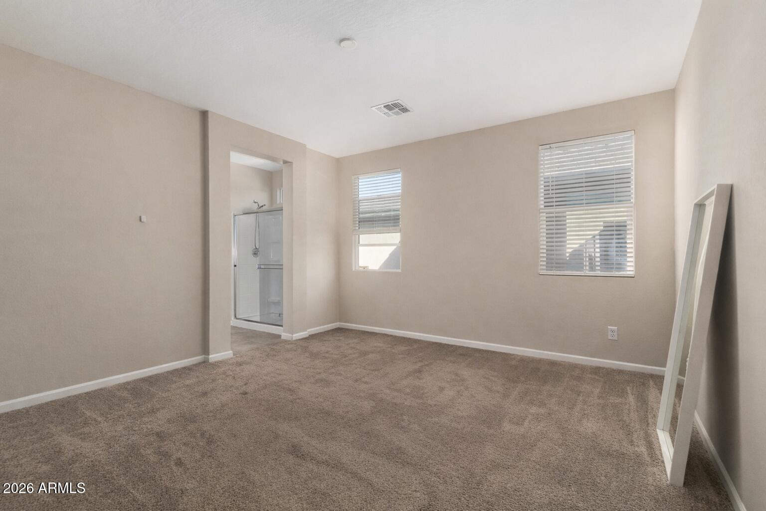 17449 West Patrick Lane Surprise, AZ 85387 - Photo 14 of 28 a view of an empty room with a window