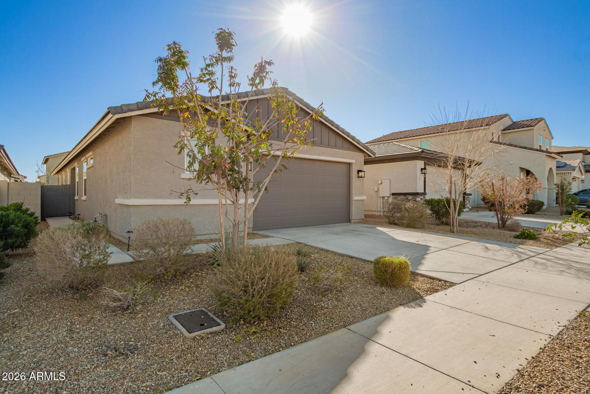 17449 West Patrick Lane Surprise, AZ 85387 - Photo 2 of 28 a view of a house with a sink