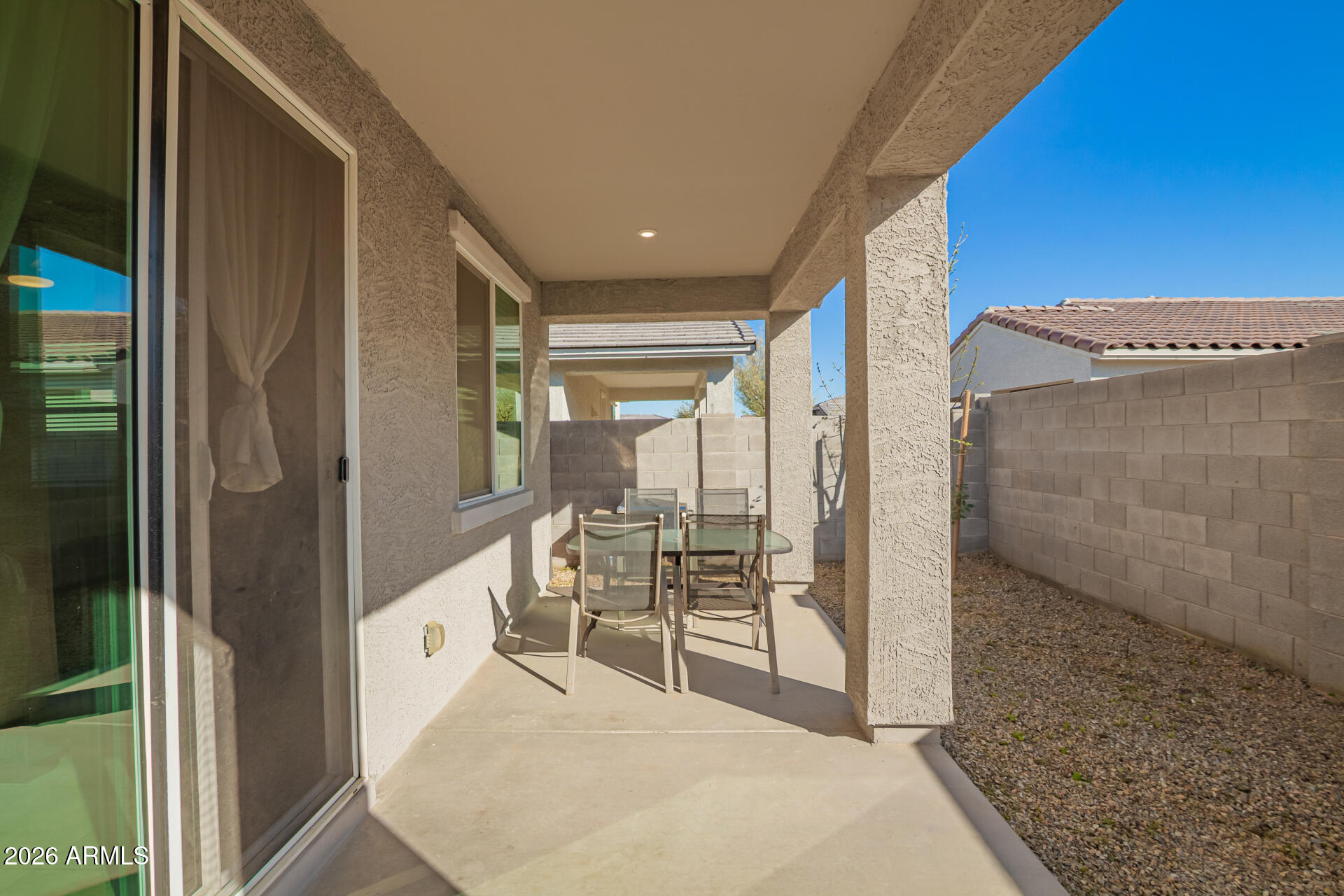 17449 West Patrick Lane Surprise, AZ 85387 - Photo 25 of 28 a view of a hallway with furniture and floor to ceiling window