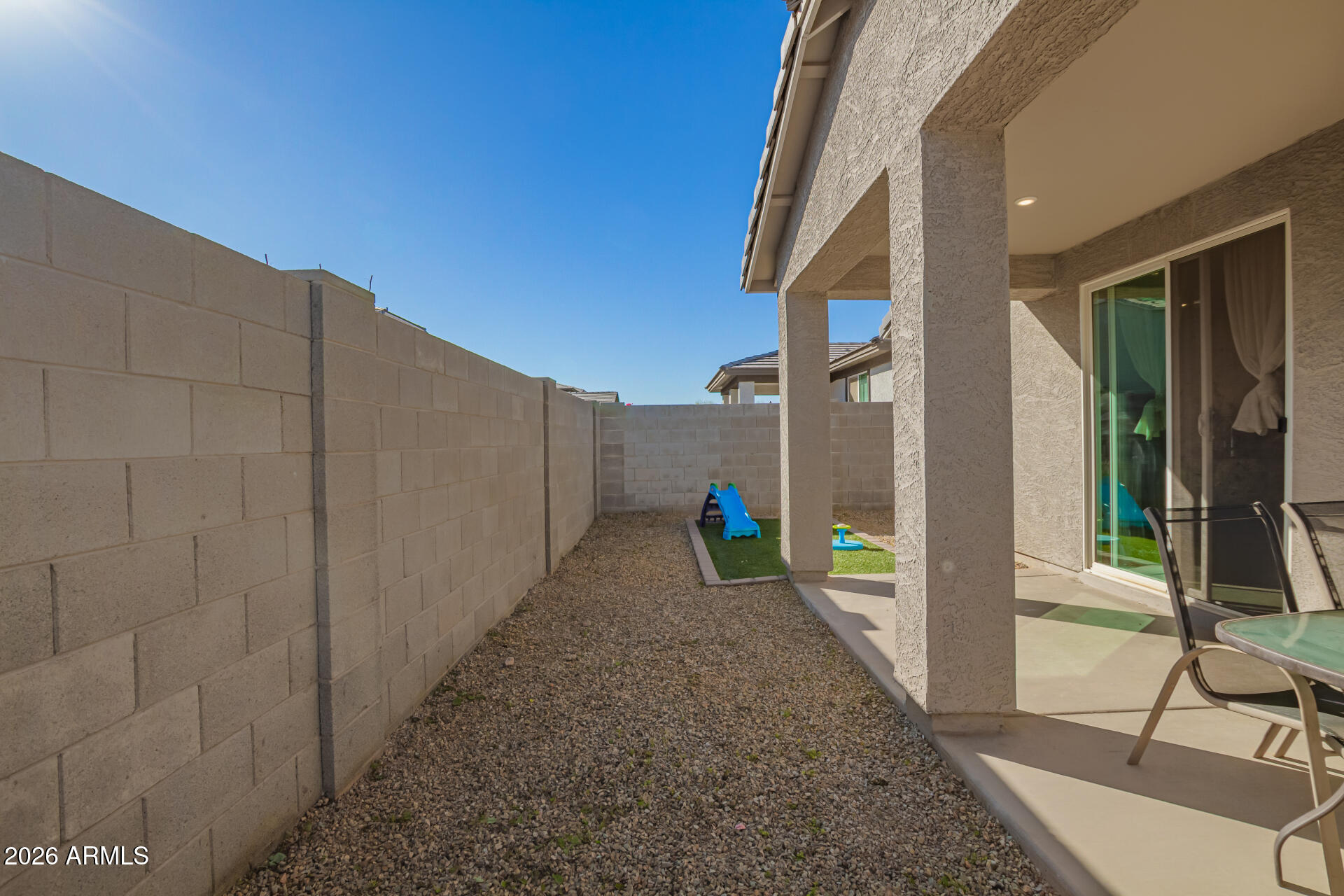 17449 West Patrick Lane Surprise, AZ 85387 - Photo 27 of 28 a house view with a backyard space