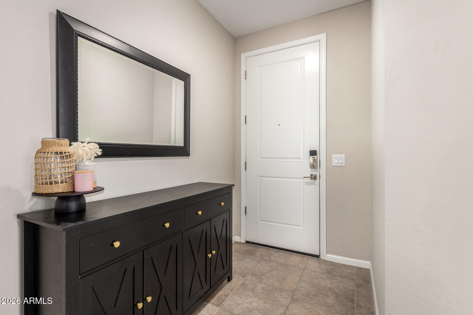 17449 West Patrick Lane Surprise, AZ 85387 - Photo 4 of 28 a bathroom with a sink vanity and mirror