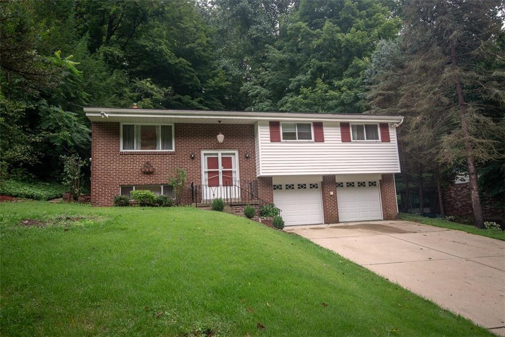 228 Hillendale Road Pittsburgh, PA 15237 - Photo 2 of 25 There is ample parking space with the 2-car integral garage and concrete driveway.