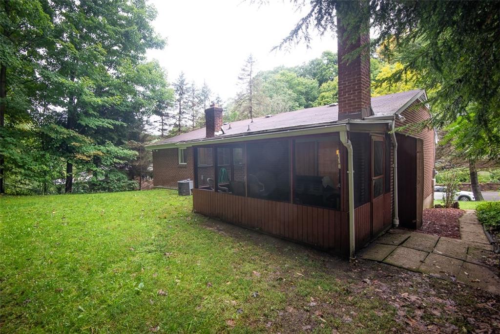 228 Hillendale Road Pittsburgh, PA 15237 - Photo 24 of 25 There is a level backyard area right off of the screened-in patio.