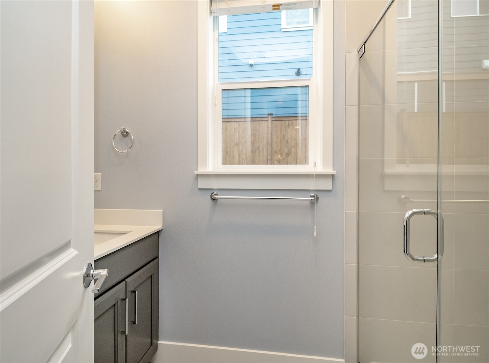 31340 43rd Place Southwest Federal Way, WA 98023 - Photo 11 of 28 a bathroom with a granite countertop sink and a window