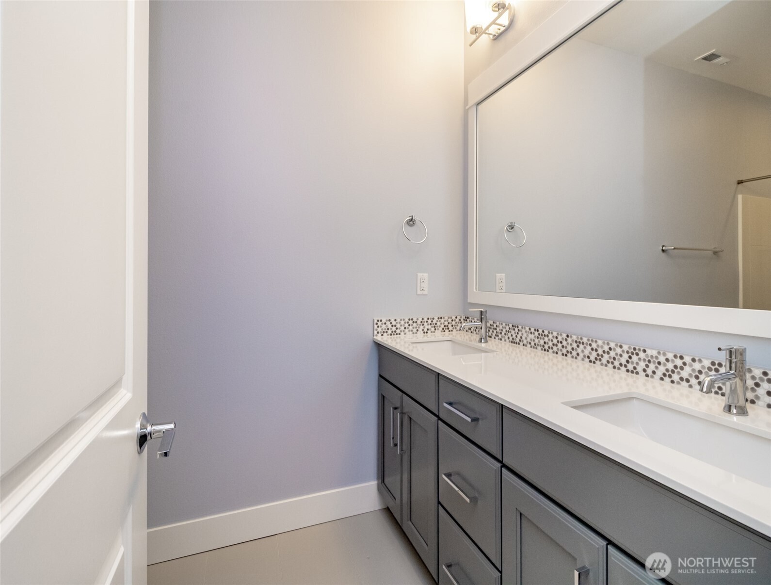 31340 43rd Place Southwest Federal Way, WA 98023 - Photo 20 of 28 a bathroom with a sink and a mirror