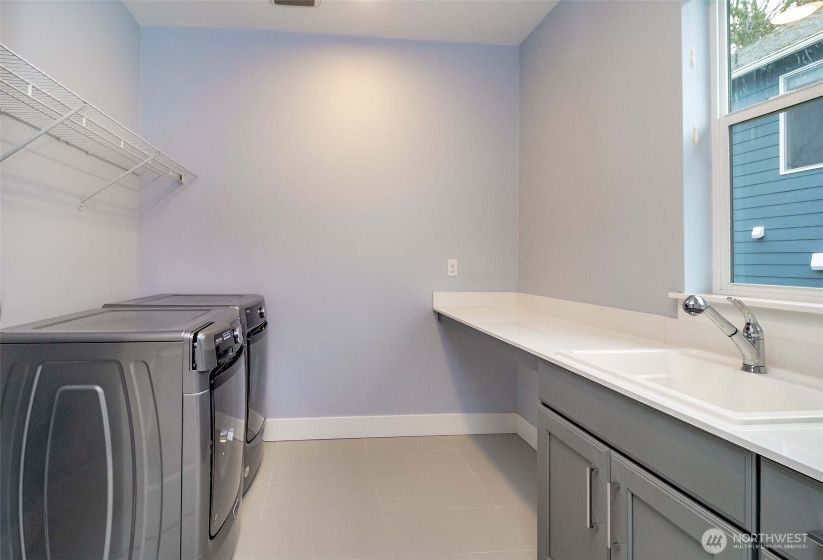 31340 43rd Place Southwest Federal Way, WA 98023 - Photo 21 of 28 a utility room with a sink a washer and dryer