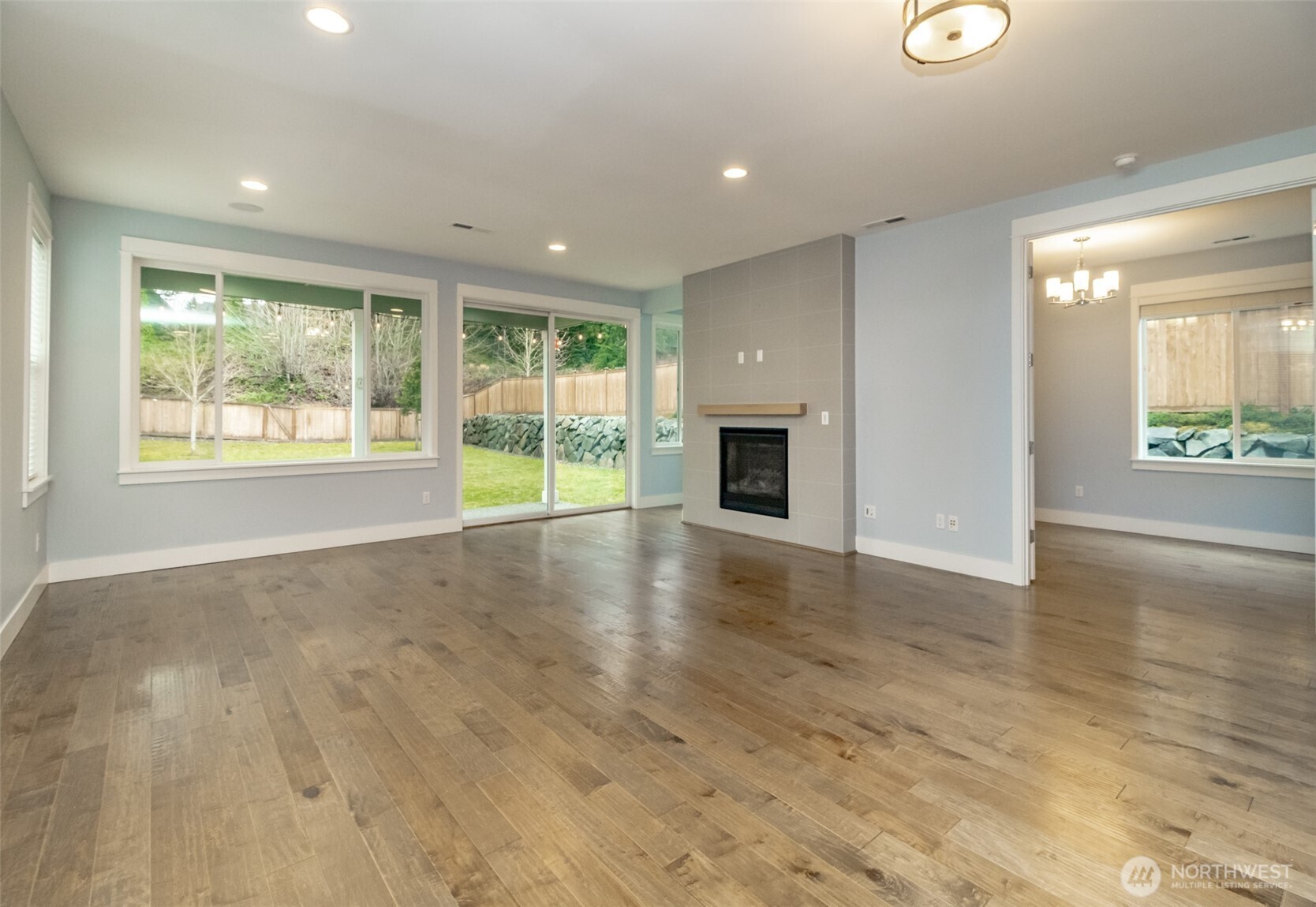 31340 43rd Place Southwest Federal Way, WA 98023 - Photo 6 of 28 a view of an empty room with wooden floor and a window