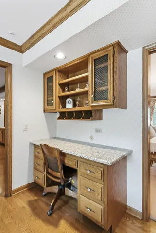 a room with a table and chairs