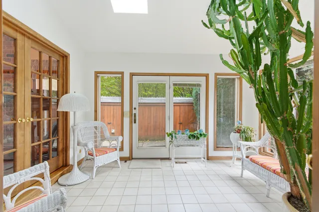 a bathroom with a glass shower door