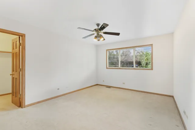 a view of an empty room with window