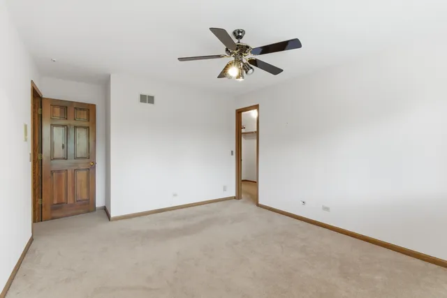 a view of a room with furniture and a garage