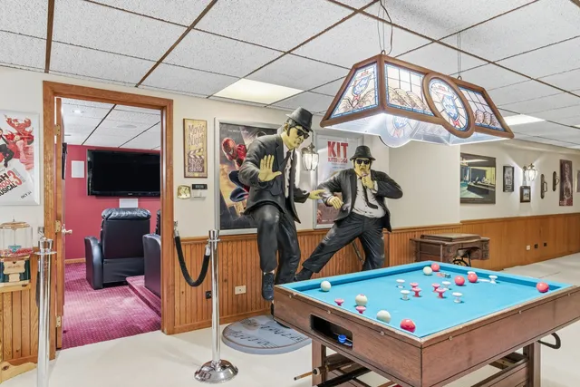 a bed room with a bed and a table